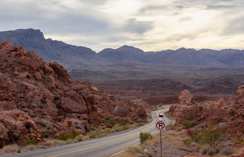 car driving at dusk in Valley of Fire